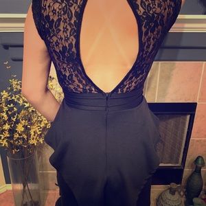 Upper lace detail, peplum, black cocktail dress.